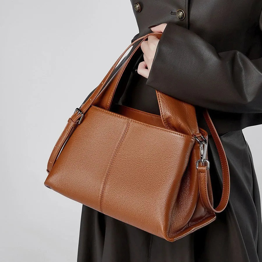 Women's cowhide messenger bag with retro texture in horizontal square shape showing double shoulder straps