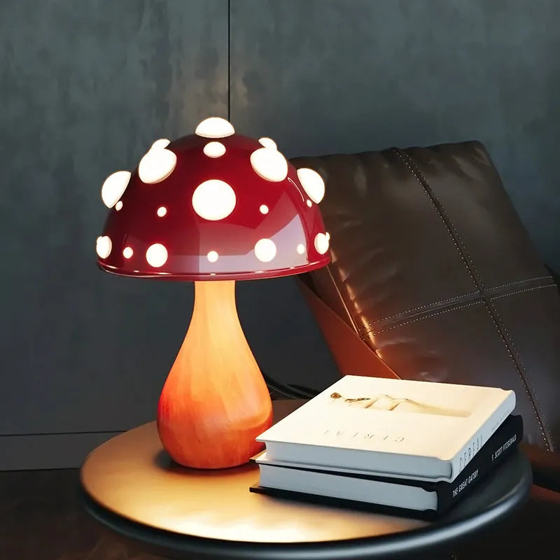 Mushroom decorative table lamp with white base and tricolour light on a wooden nightstand