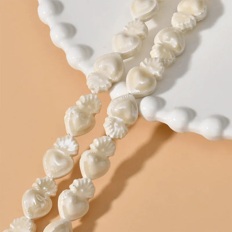 Ceramic love heart beads in assorted colours, 10x15mm with 1.7mm hole, 20-piece pack