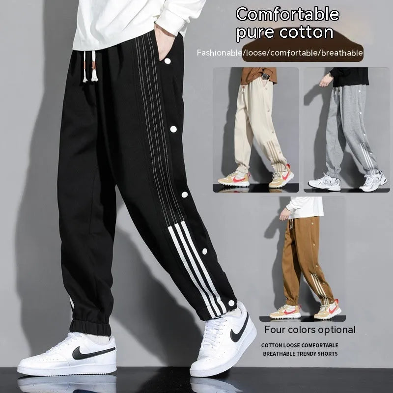 Men's loose grey ankle-tied sports sweatpants with drawstring waist