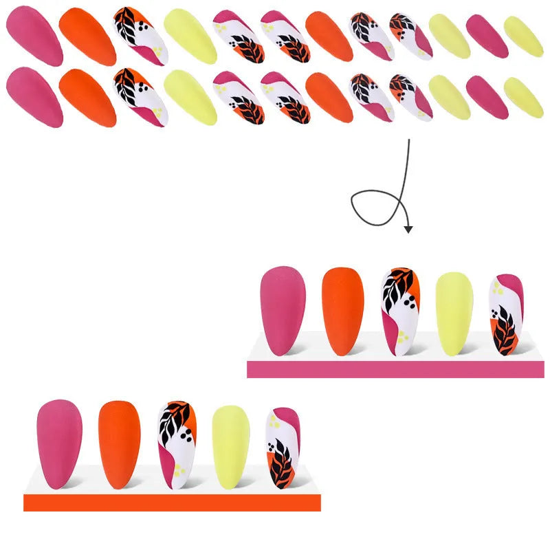 Wear Armour Medium Almond Frosted Nail Stickers four-box pack showing French leaves, leopard print, macaron, and plating designs.