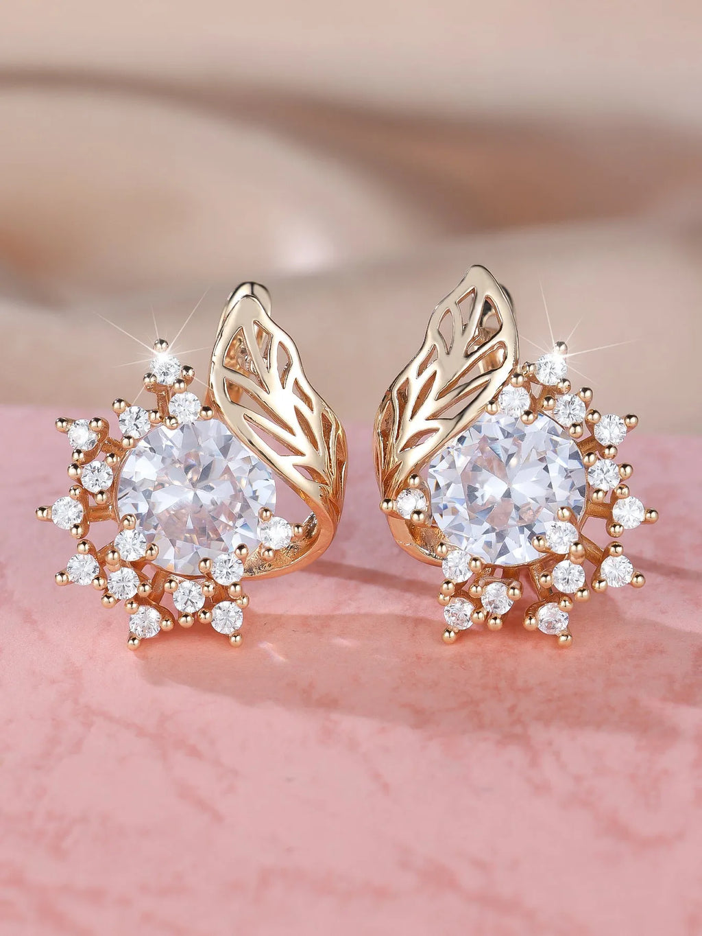 Round floral feather earrings with zircon stone centre in champagne gold finish, available in six coloured diamond options