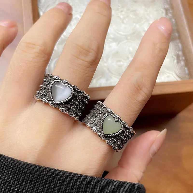 Retro wide-faced heart ring with adjustable opening in white or green colour