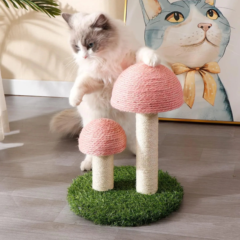 Pink mushroom-shaped cat scratching post with sisal-covered pole for kittens and small cats