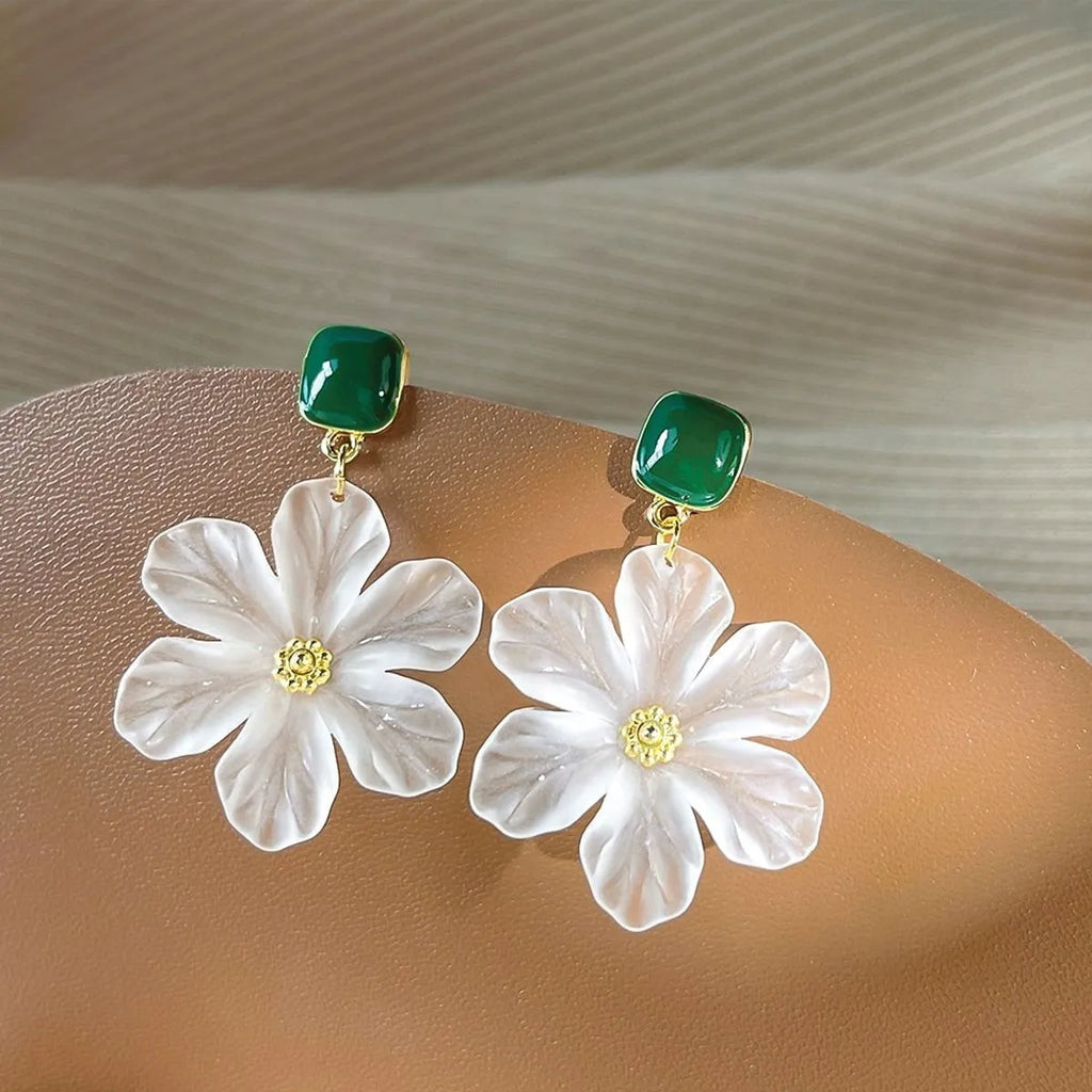Dark green sweet flower dangle earrings with needle detailing on petals and sterling silver ear wires