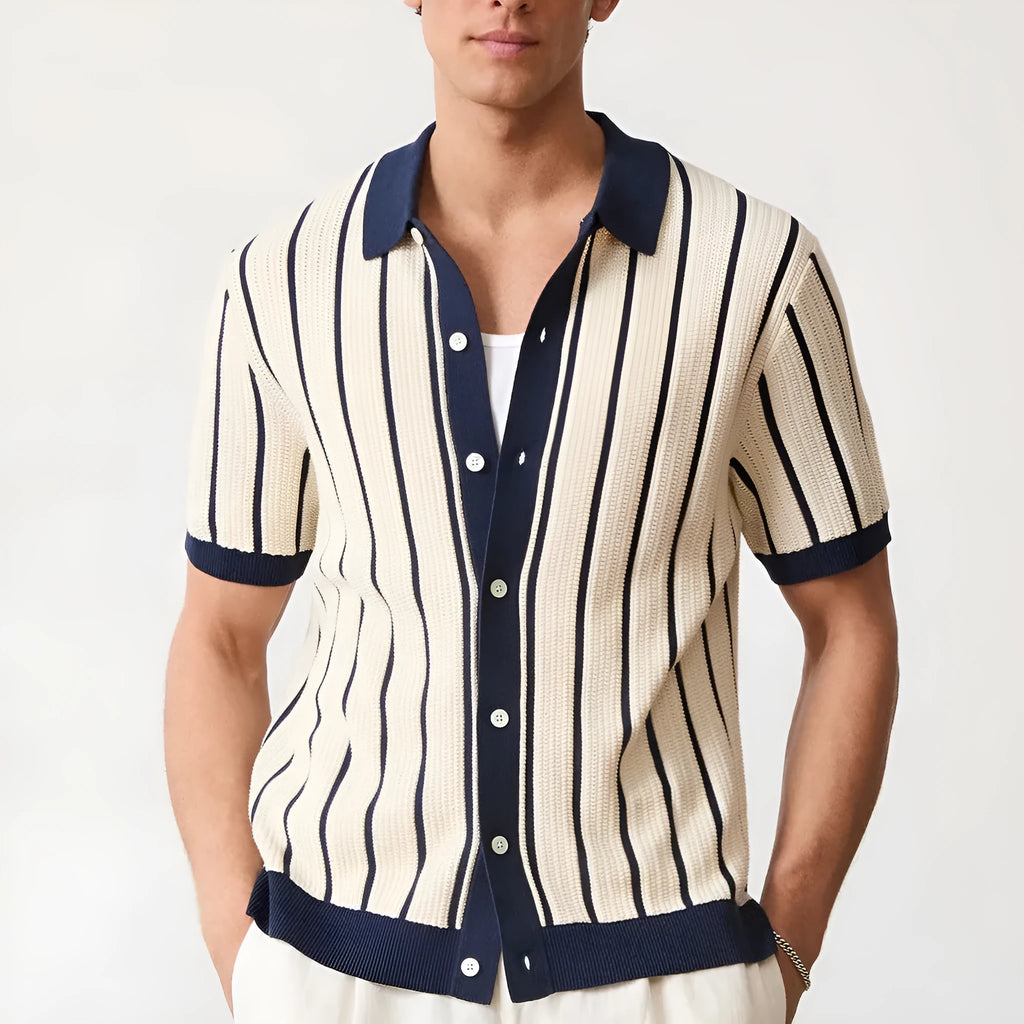 Men's white asymmetric short sleeve knitted top with a lapel, shown on a model.