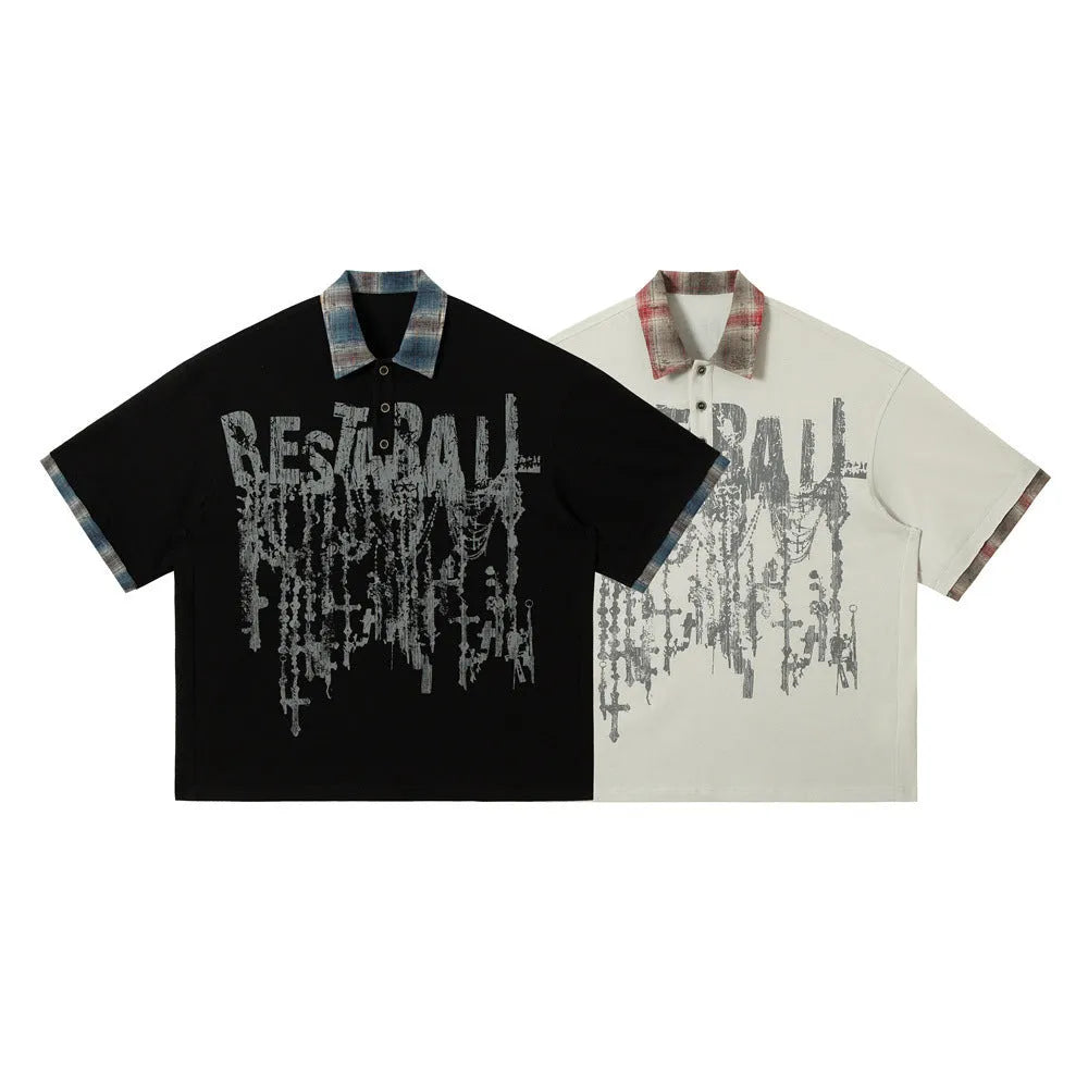 Men's loose blue short-sleeved top with asymmetric lapel and graffiti-style print.