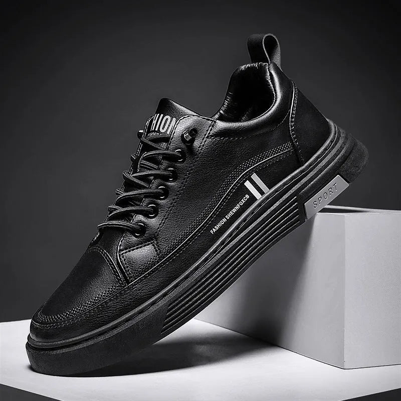 Men's white low-top skate shoes with an elastic band and round toe, on a rubber sole.