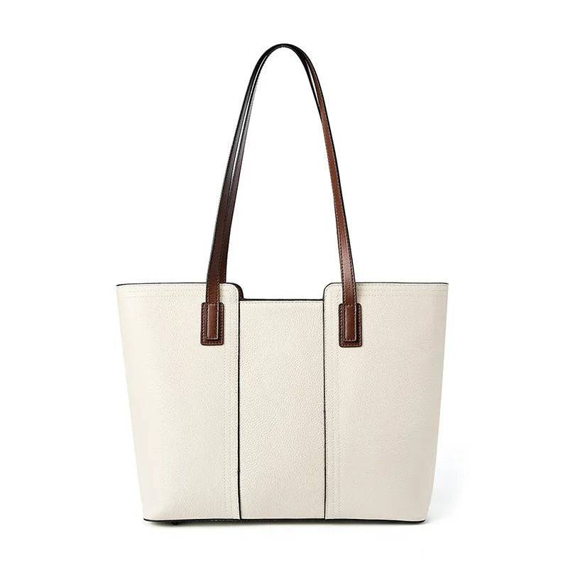 Women's black genuine leather crossbody commuter bag with horizontal square design showing internal organisation compartments