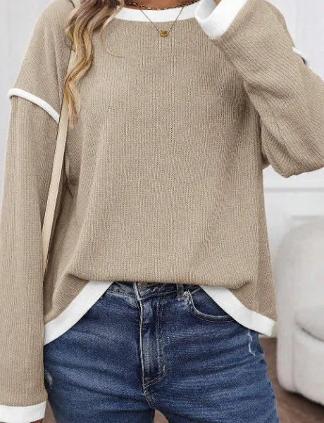 Drop shoulder loose knit top with four leaf clover pattern and contrast colour trim
