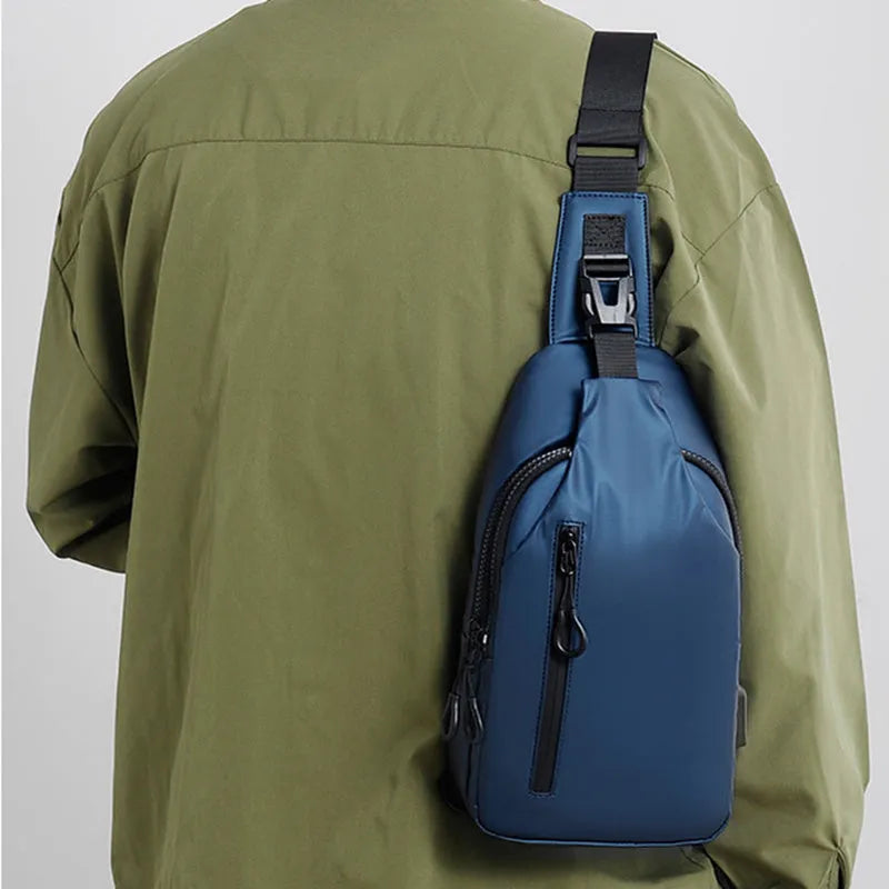 Black sling crossbody chest bag for men, simple city style, vertical square shape, zipper closure, soft surface, blue black grey