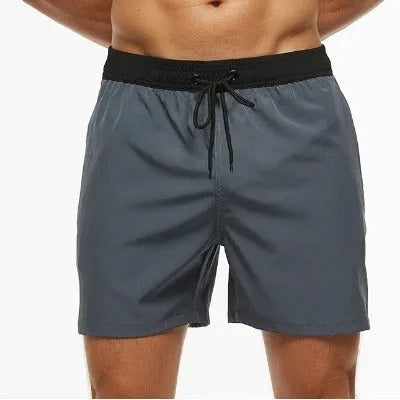 Men's blue stitching waist drawstring athletic shorts with zipper pocket and padding