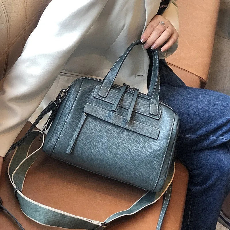 Genuine leather shoulder messenger bag with litchi pattern texture in a horizontal square shape.