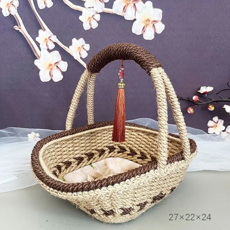 Hand-woven straw basket with hemp rope detailing in rustic coffee brown colour