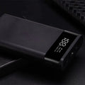 Power bank spring kit with black plastic shell, cylindrical aluminium case, multi-U port output, 45x76x22mm