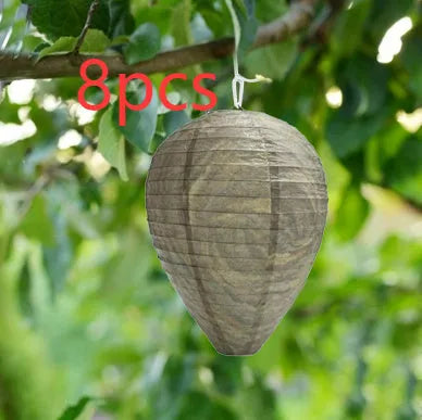 Hexagonal paper beehive lantern with wire frame, shown in photo colour.