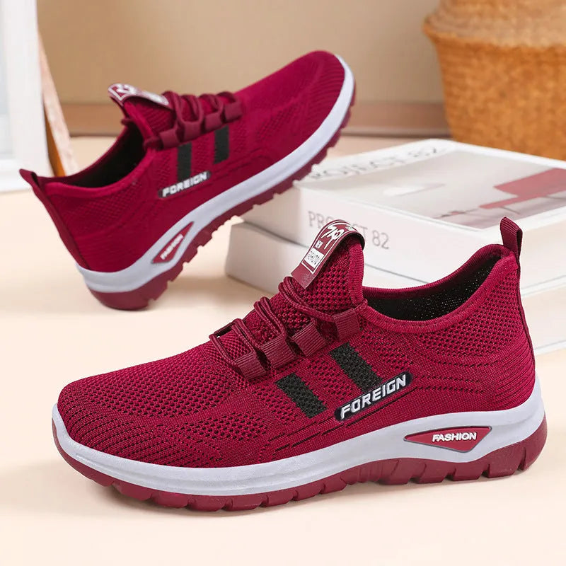 Breathable mesh casual shoes with PVC sole, low top, flat heel, round toe, shallow mouth, available in UK sizes 36-41 in black, gray, purple, and red