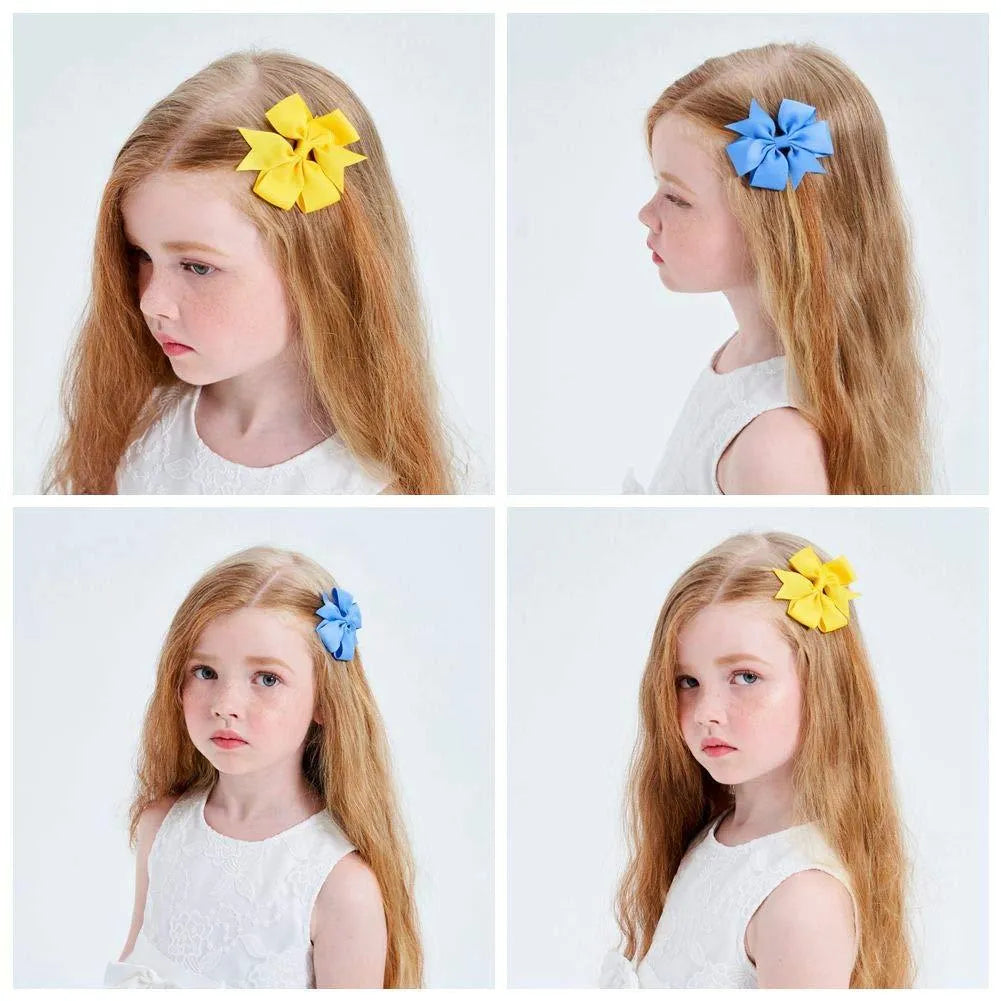 Set of 20 handmade grosgrain ribbon hair bows with alligator clips in assorted colours, each 3 inches long, on a white background