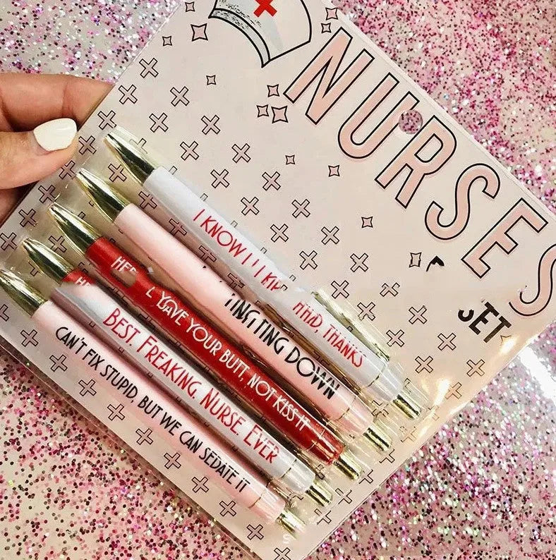 Set of five blue and pink nurse-themed retractable ballpoint pens on a white background.