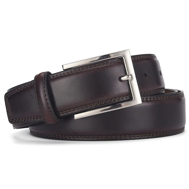 Men's black genuine leather belt with silver alloy pin buckle, showing adjustment holes and patent leather finish.