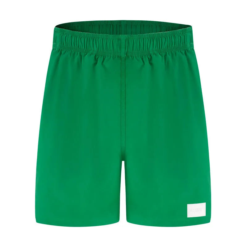 Men's quick-drying nylon sports shorts in solid colours with straight-leg style