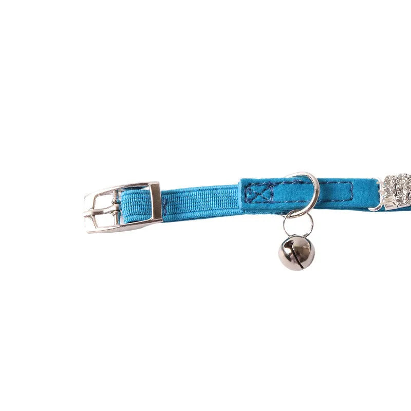 Soft flocking cat collar with elastic buckle and gang drill design in multiple colours.
