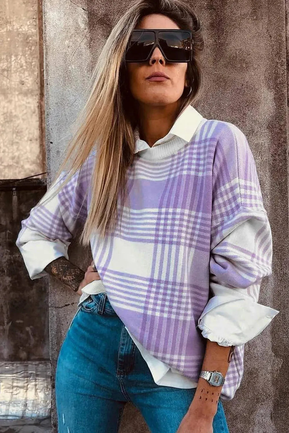 Lilac plaid print loose fit sweater with long sleeves and ribbed trim.