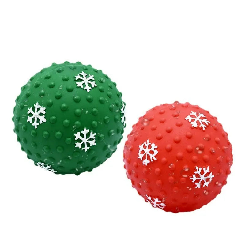 Red and green festive dog toy balls with snowflake patterns, 7cm diameter, with squeaker and air vents