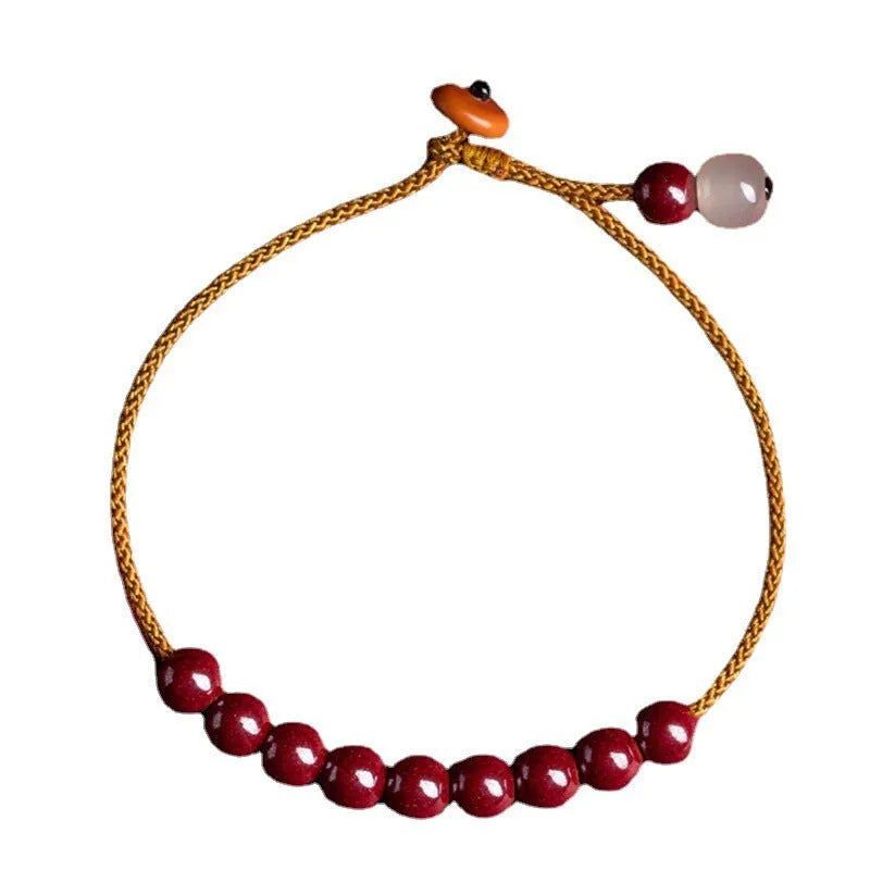 Hand-woven cinnabar geometric bracelet with a raw ore design.