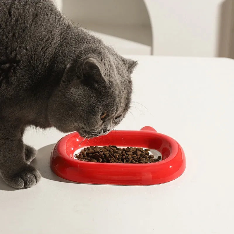 Ceramic animal-shaped cat bowl in a colourful design for pet feeding