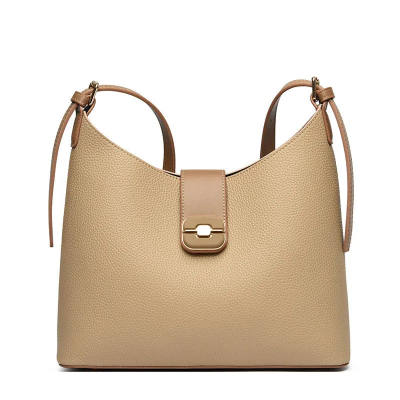All-matching simple large-capacity bucket bag in black, urban simplicity style with stitching and lock detail