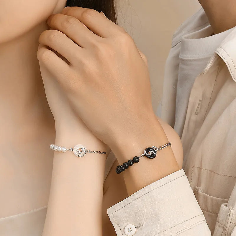 925 Sterling Silver Chinese Obsidian Pearl Couple Bracelet with snake design and safe buckle.