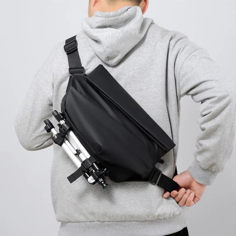 Grey PU leather crossbody bag showing internal phone and document compartments with zip opening