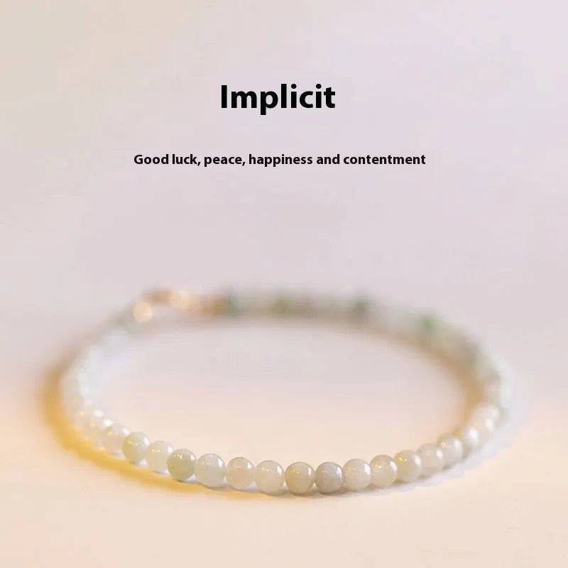 Women's Korean style retro bracelet with a jade ball charm on a chain.