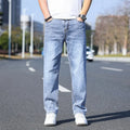 Thin stretch cotton denim tapered trousers in business casual style, available in four colours