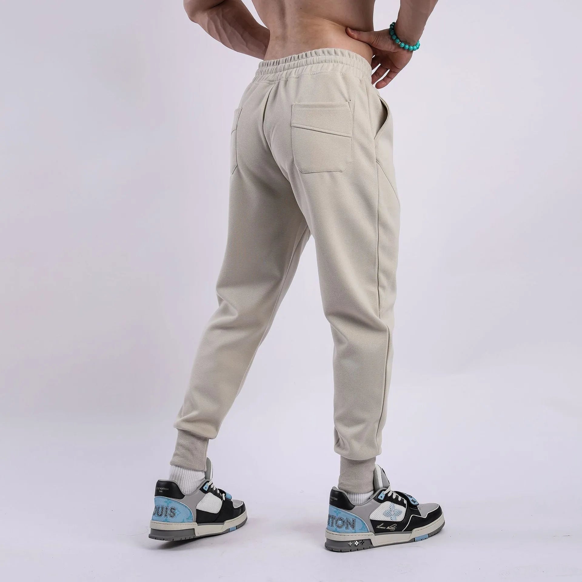 Men's casual ankle-tied drawstring sweatpants in black, polyester cotton fabric, mid waist, available in 5 sizes