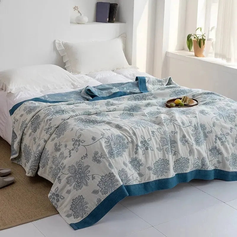 Thickened five-layer pure cotton gauze bed blanket in a modern simple style, shown in blue.