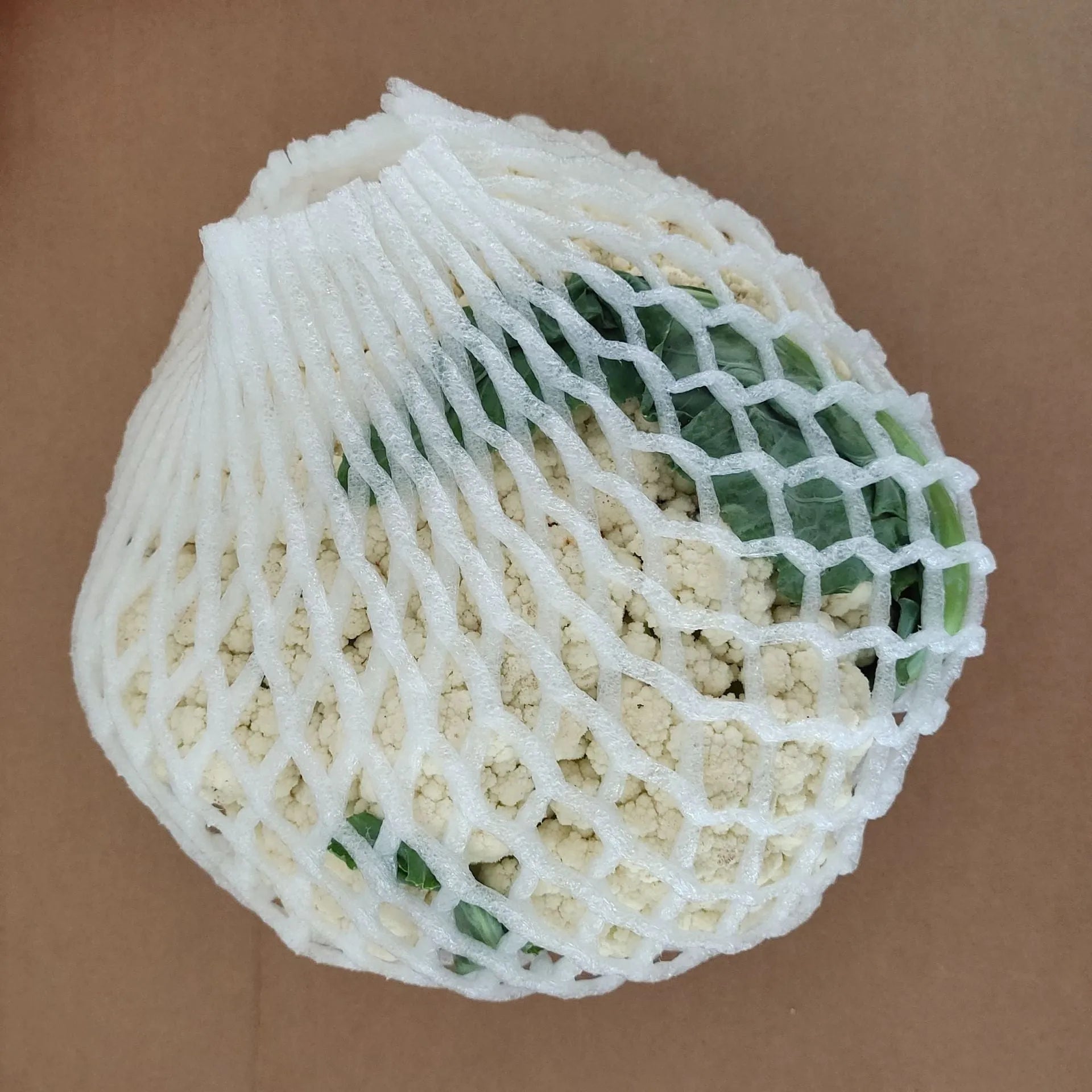 White foam fruit net protective cover for produce cushioning and shockproof packaging