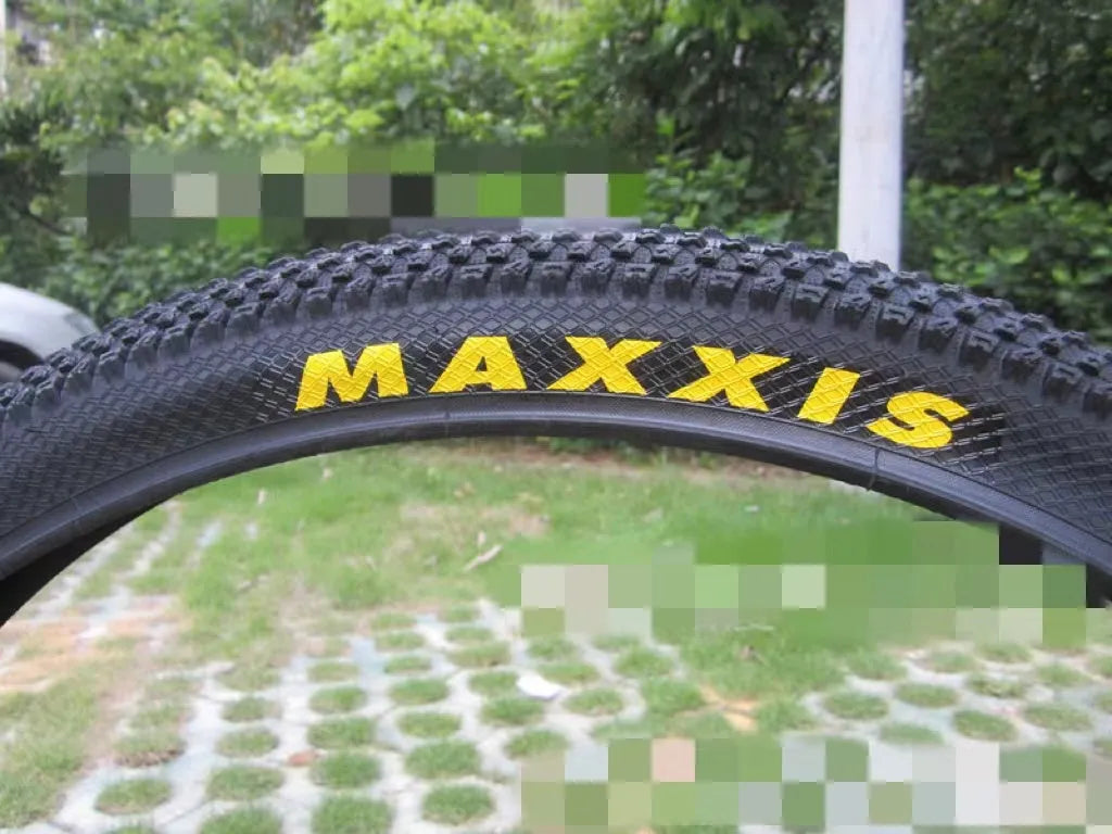 Mountain bike ultralight puncture proof tyre shown in black with white label sidewall option.