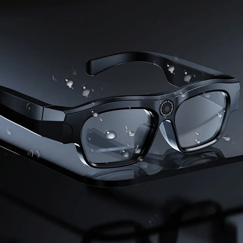 Black head-mounted smart glasses with a camera lens and touch controls on the frame.