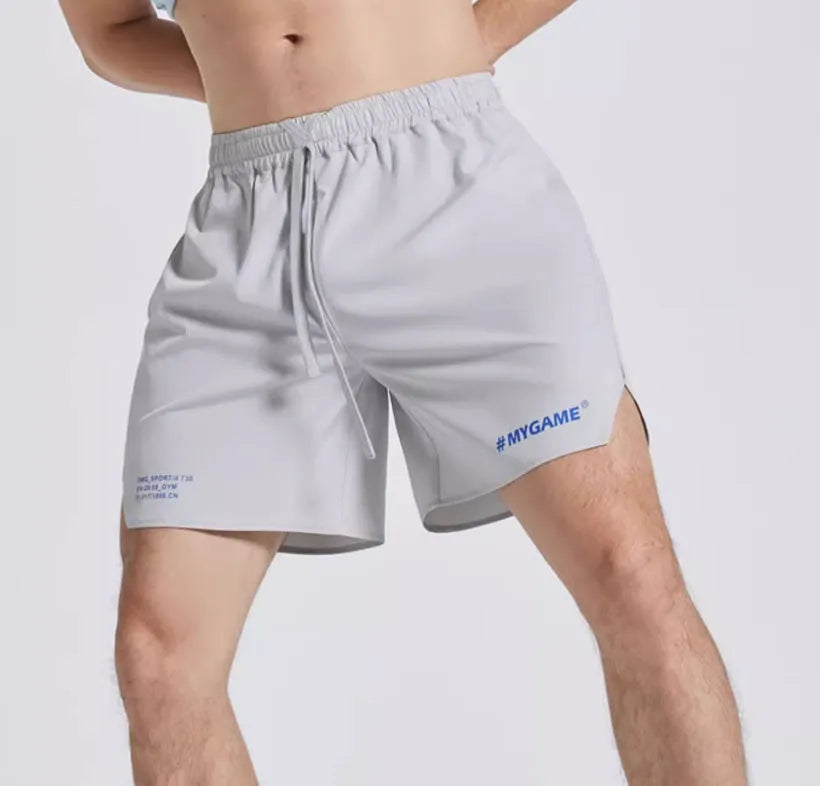 Men's fitness training shorts in four-point design, shown in available colours.