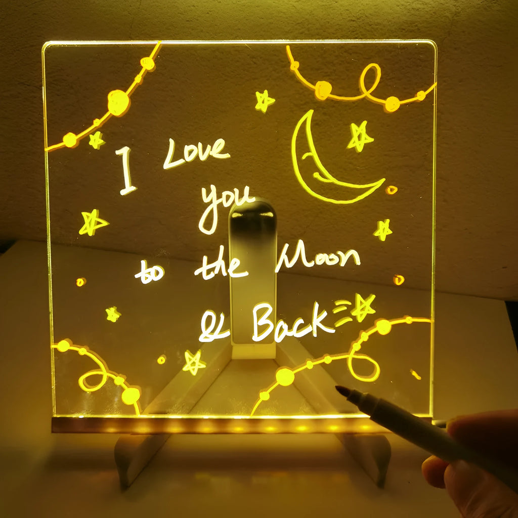 Acrylic DIY note board LED night light showing a transparent board with written messages, USB power, and bracket setup