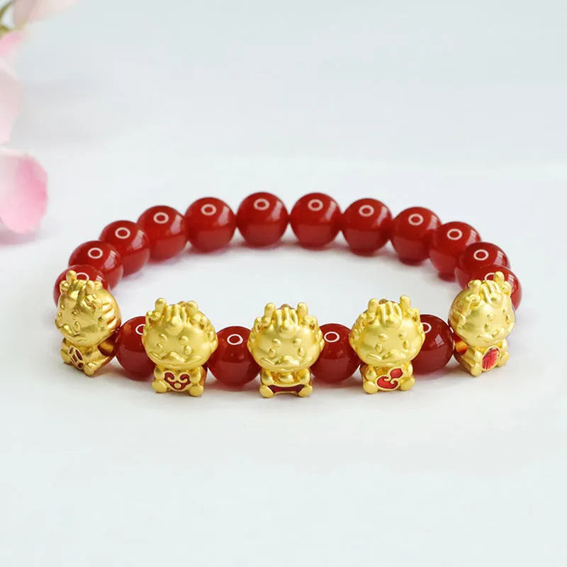 Red agate bracelet with detailed dragon carving on an 8mm bead.