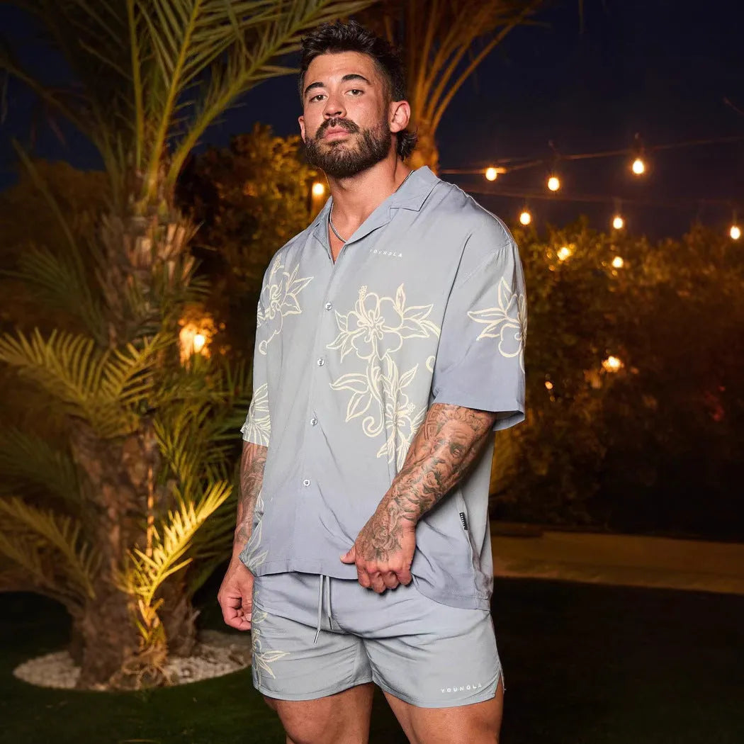 Men's loose-fitting printed short sleeve top with floral pattern in light colours