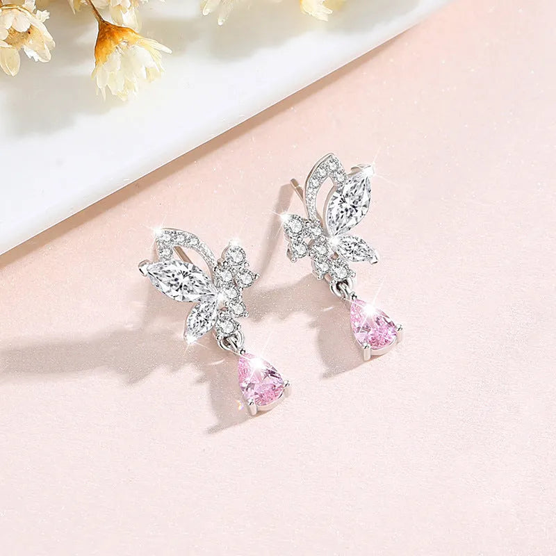 Crystal butterfly 925 silver stud earrings for women on white background