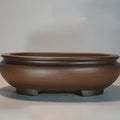 Handmade classical purple sand clay desktop flowerpot measuring 58cm wide.
