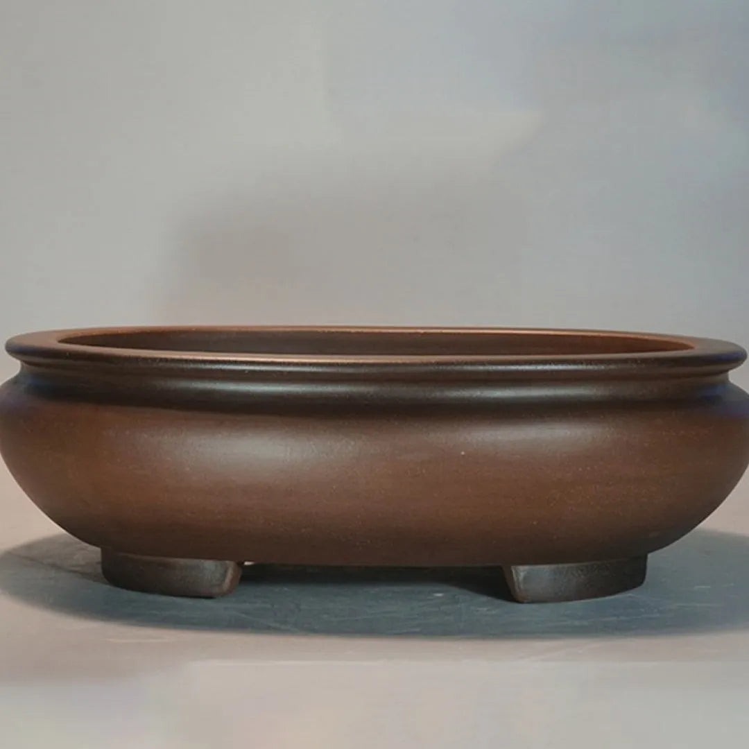 Handmade classical purple sand clay desktop flowerpot measuring 58cm wide.