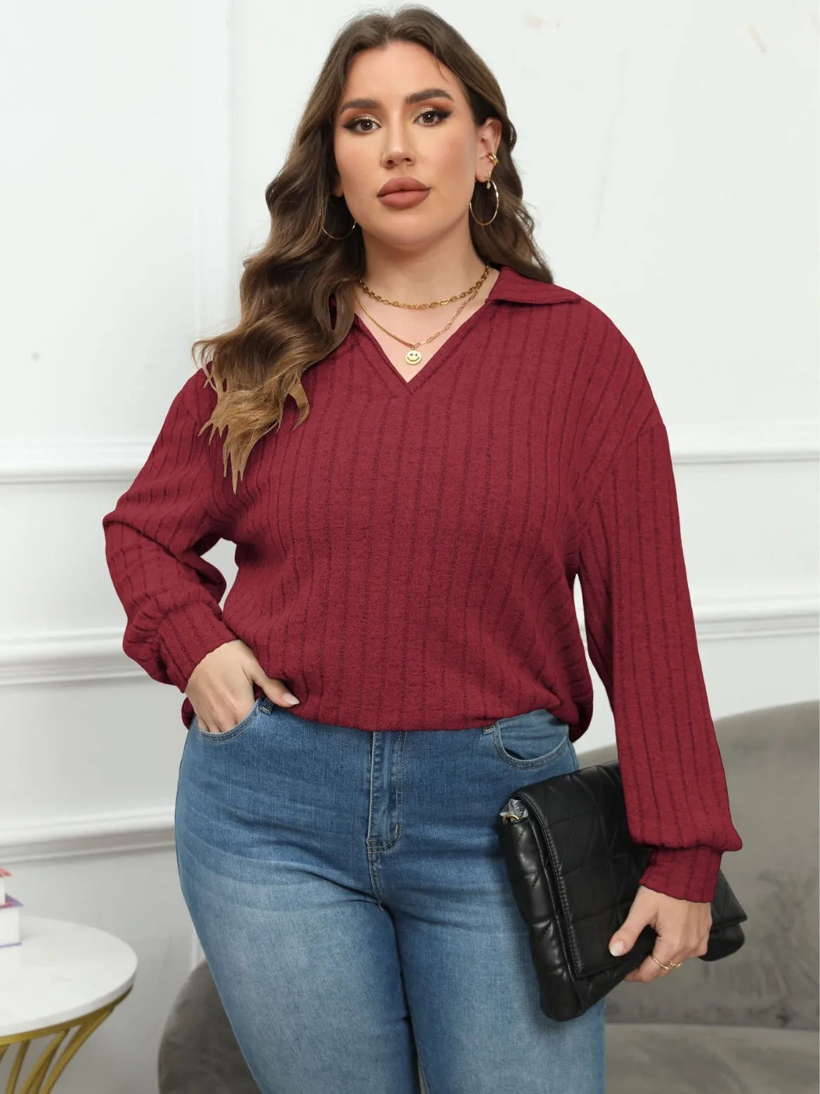 Women's plus size gray polo collar shirt with full lantern sleeves in a street fashion style.