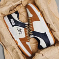 Casual lace-up sneakers in simple design with youth fashion styling available in multiple colour options