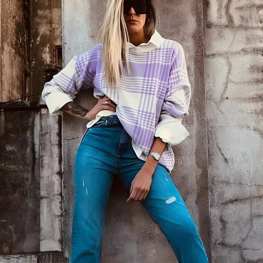 Lilac plaid print loose fit sweater with long sleeves and ribbed trim.